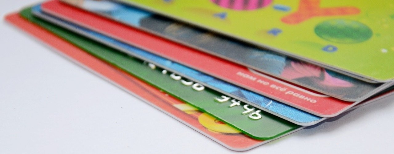 There is a photo of six different coloured cards, like the ones you usually have in your wallet.