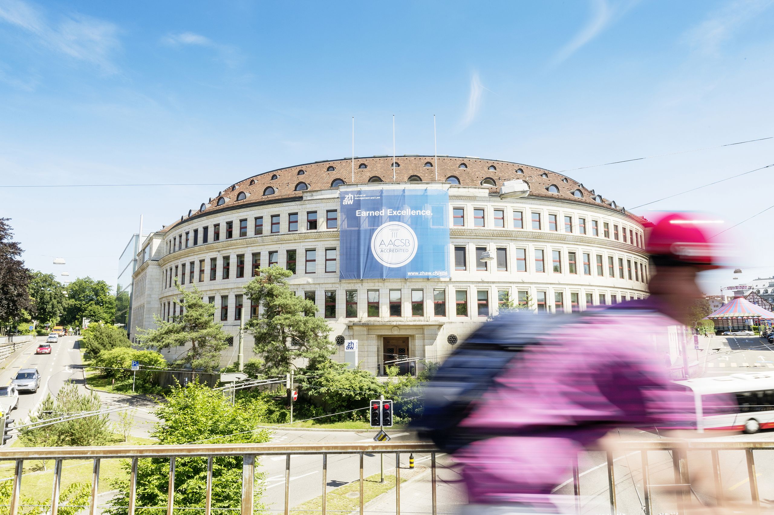 Volkart building in Winterthur at Campus St.-Georgen-Platz, white round building at a crossroads