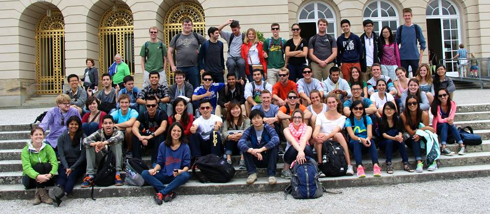 Students in front of Herrenchiemsee Palace on Herreninsel on a beautiful, sunny day