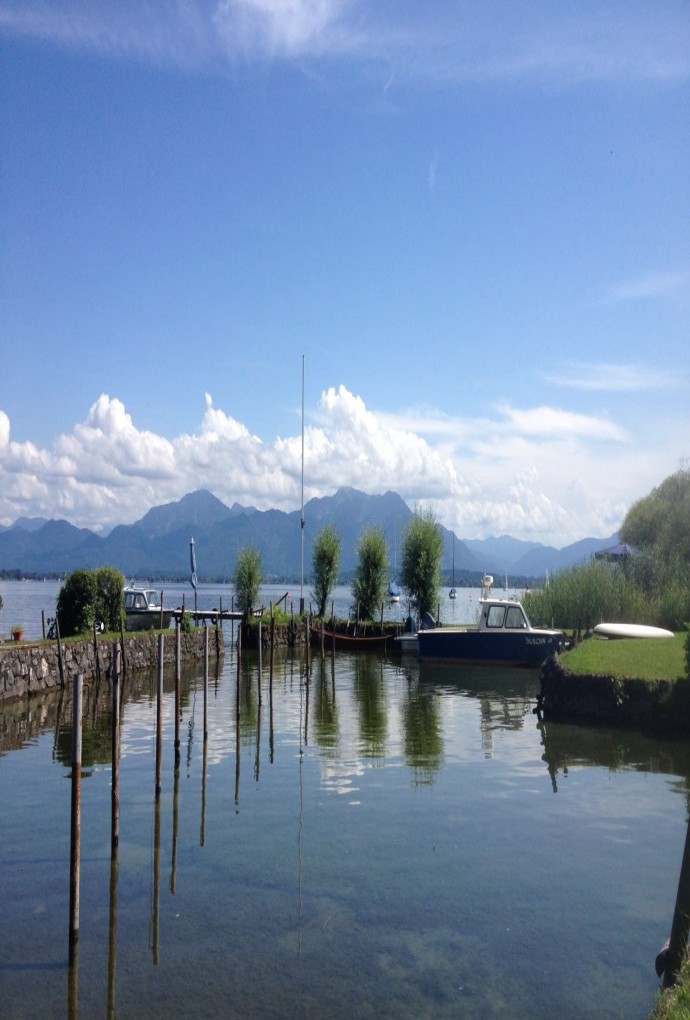Beautiful scenery of Lake Chiemsee from Herreninsel, overlooking the lake and the Alps