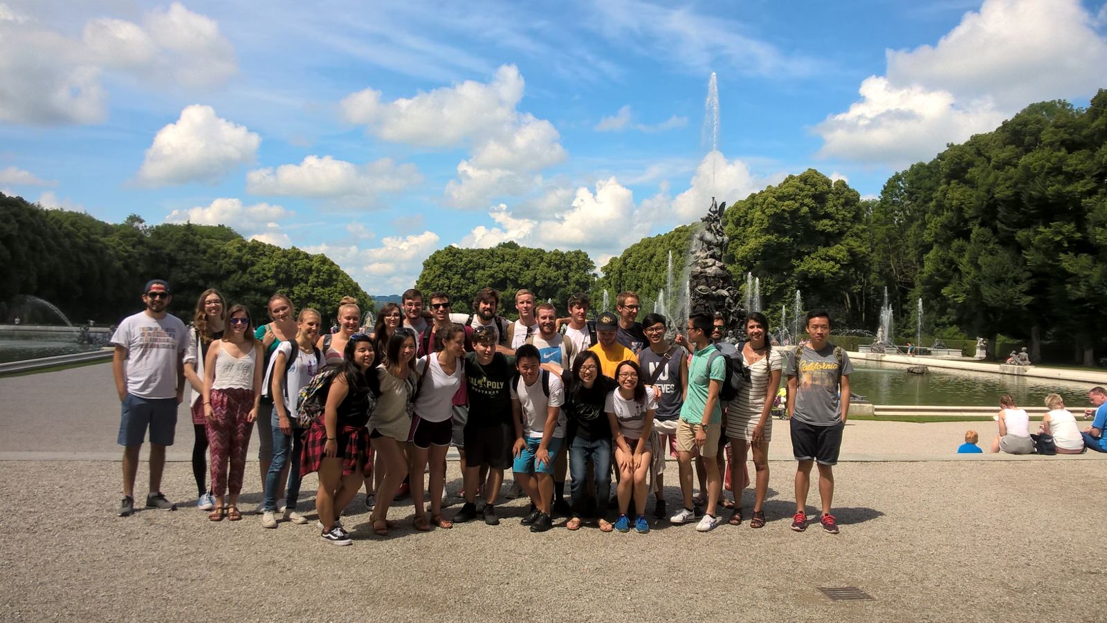 Students in front of Herrenchiemsee Palace, overlooking the beautiful trees