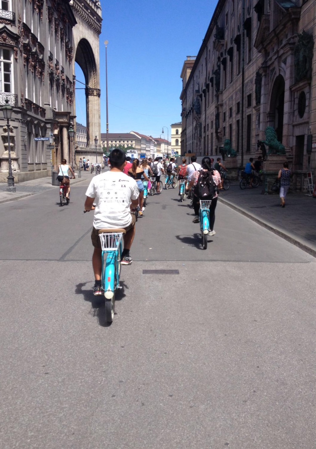 Students at the Munich Bike Tour, cycling towards Odeonsplatz