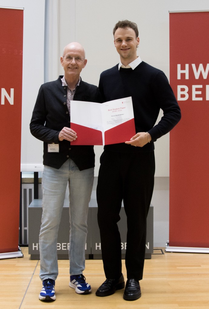 Best Paper Award: Prof. Dr. Jörg Puchan und Paskal Bekker